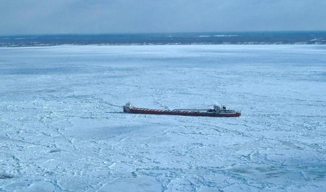 The freighter Arthur M. Anderson is caught in ice near Conneaut, Ohio, on Feb. 19. Icebreaking vessels from the U.S. and Canadian coast guards worked to free the Anderson. (Canadian Coast Guard photo via the U.S. Coast Guard)